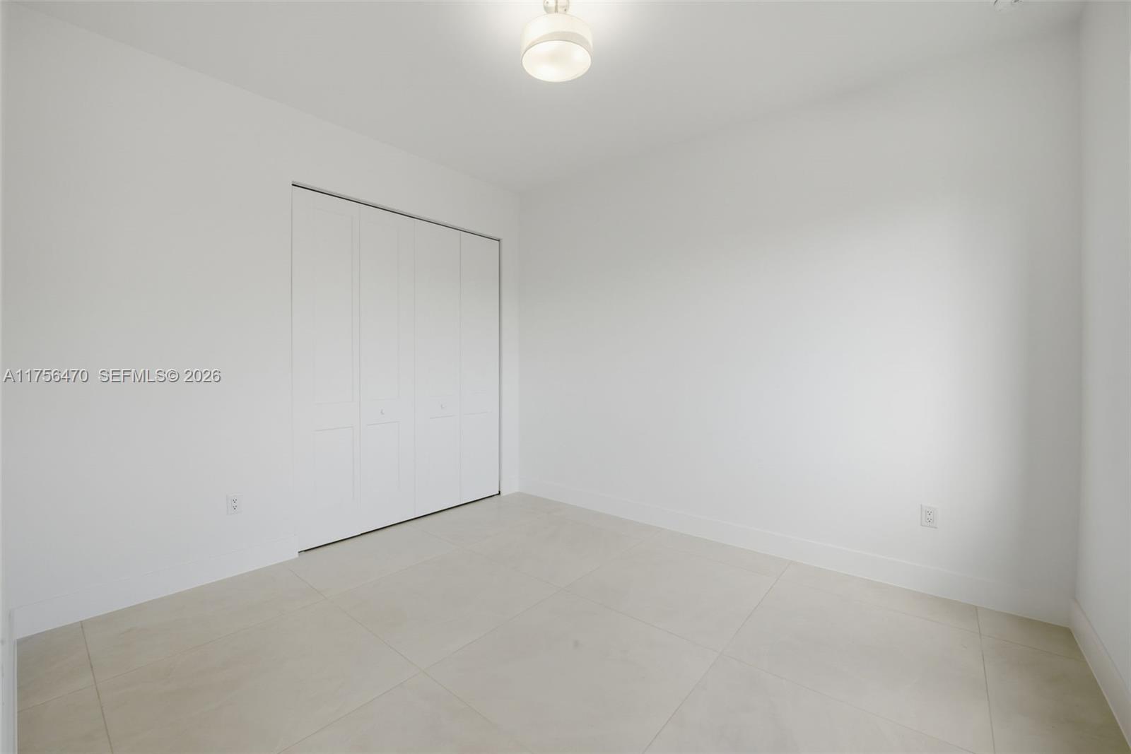 2725 Southwest 65th Avenue Miami, FL 33155 - Photo 14 of 36 an empty room with a empty space