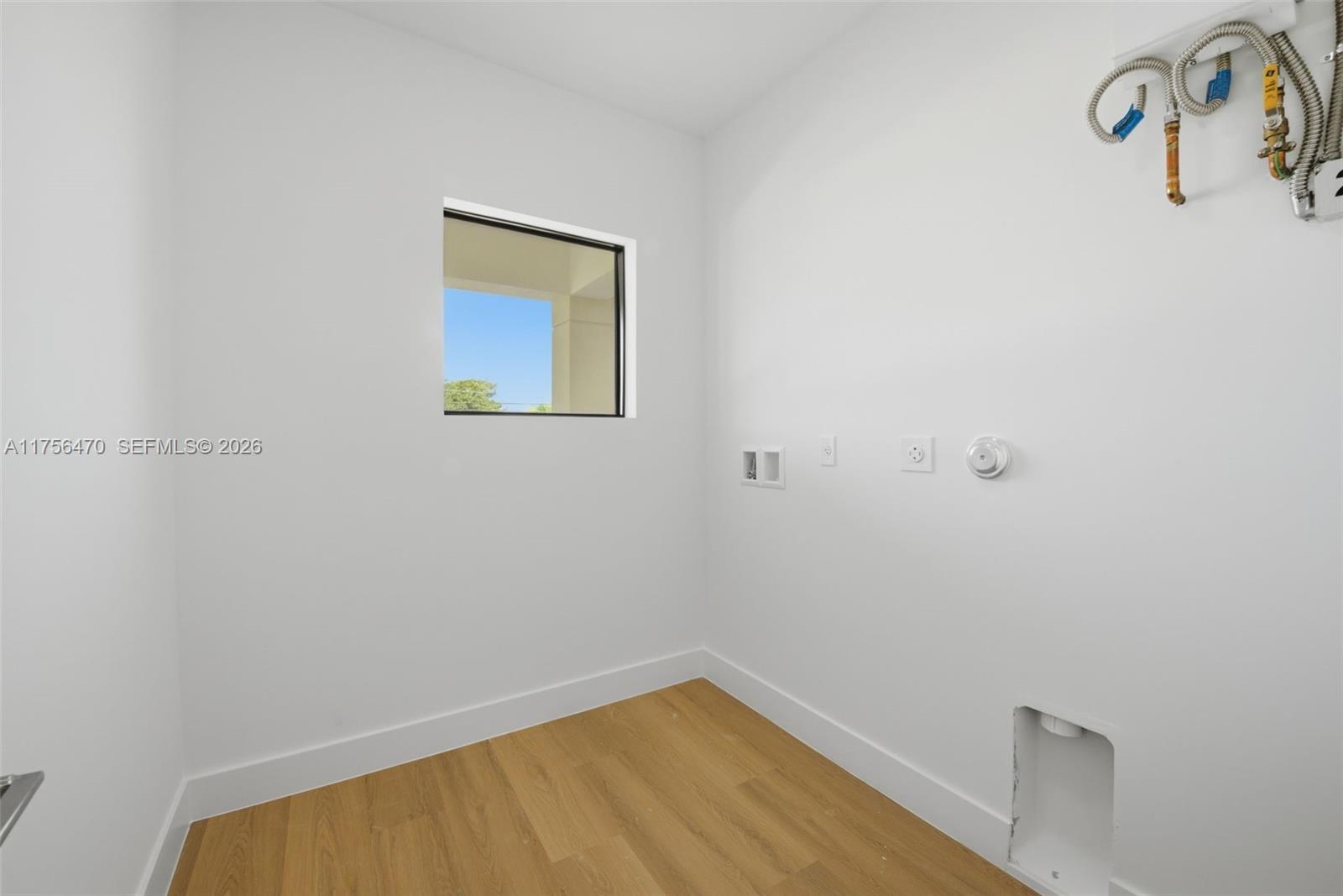 2725 Southwest 65th Avenue Miami, FL 33155 - Photo 15 of 36 a view of a room with a hanging light
