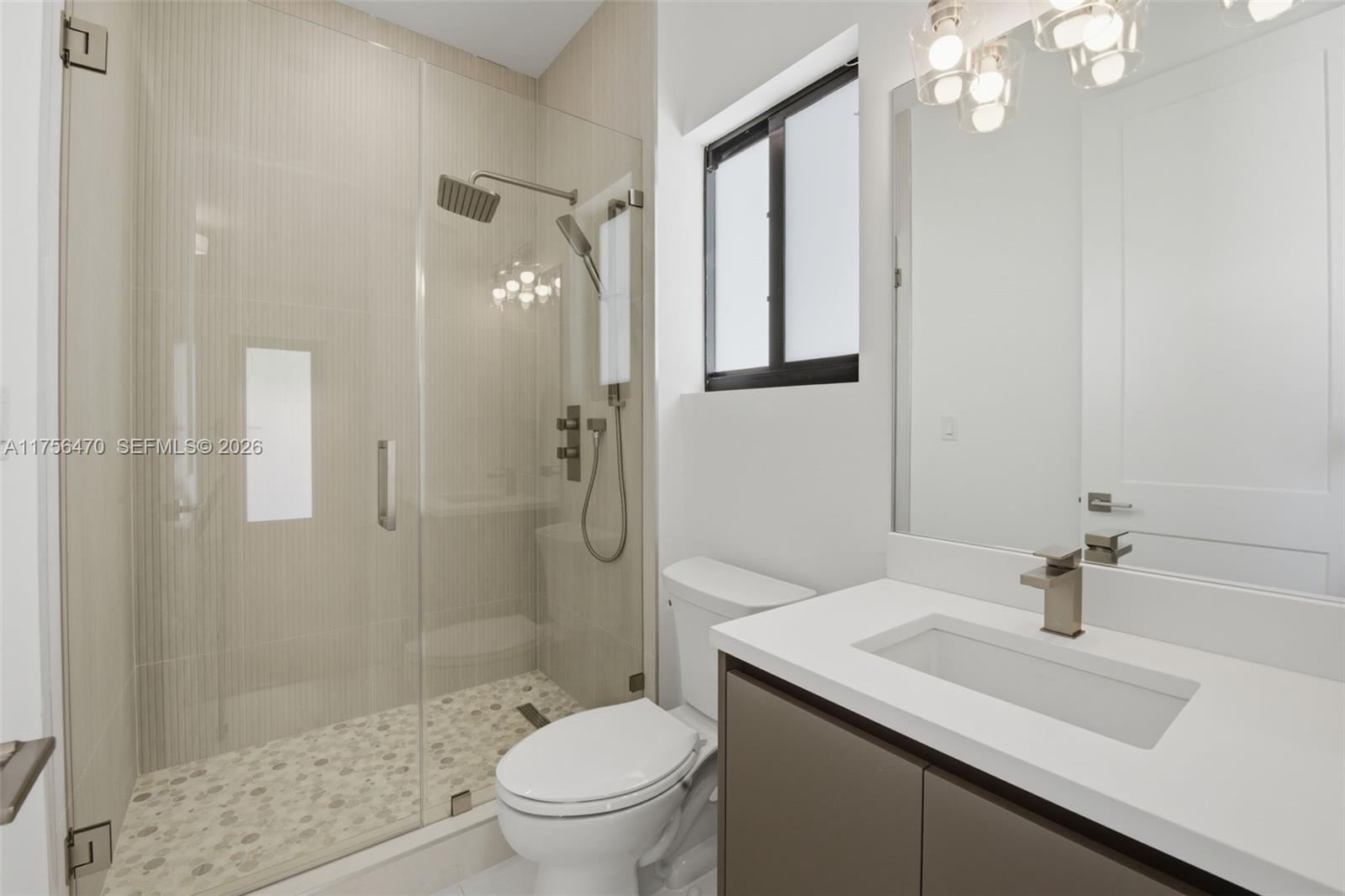 2725 Southwest 65th Avenue Miami, FL 33155 - Photo 18 of 36 a bathroom with a sink toilet and shower