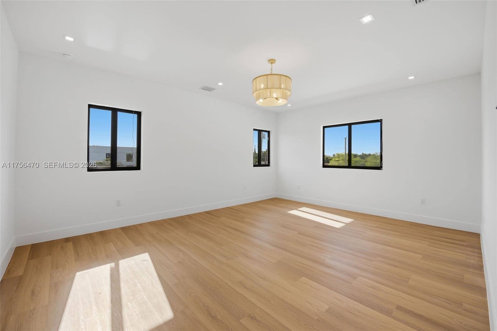 2725 Southwest 65th Avenue Miami, FL 33155 - Photo 21 of 36 a view of an empty room and window