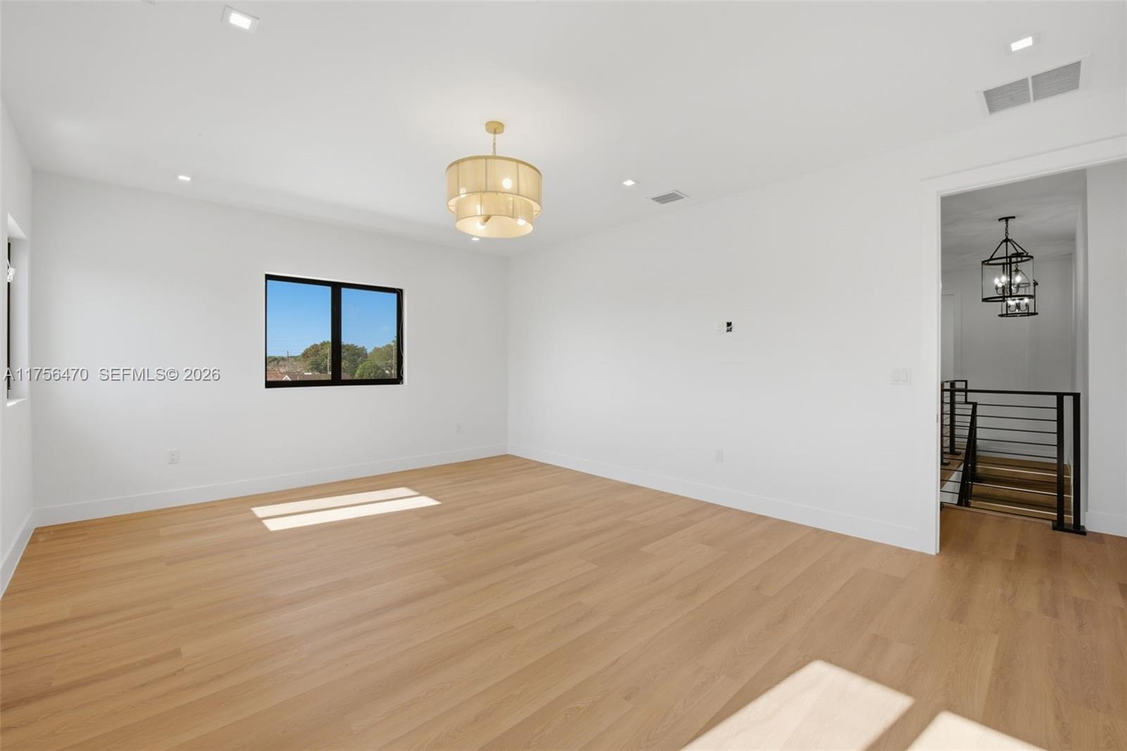 2725 Southwest 65th Avenue Miami, FL 33155 - Photo 22 of 36 a view of empty room with wooden floor