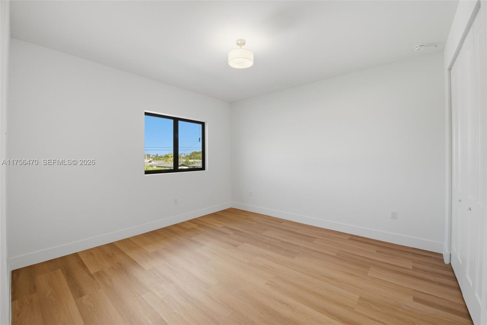 2725 Southwest 65th Avenue Miami, FL 33155 - Photo 26 of 36 a view of empty room with wooden floor