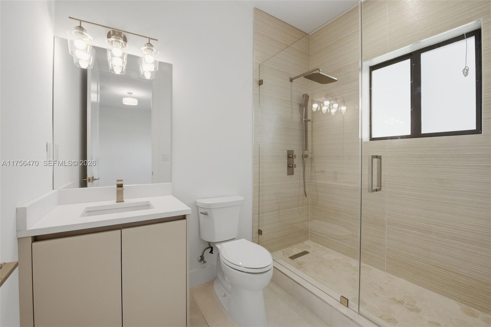 2725 Southwest 65th Avenue Miami, FL 33155 - Photo 28 of 36 a bathroom with a sink toilet and shower