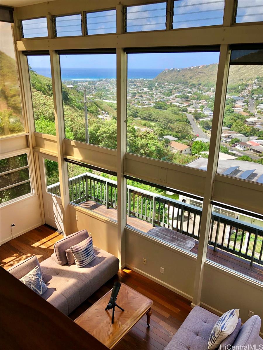 a living room with furniture and a window