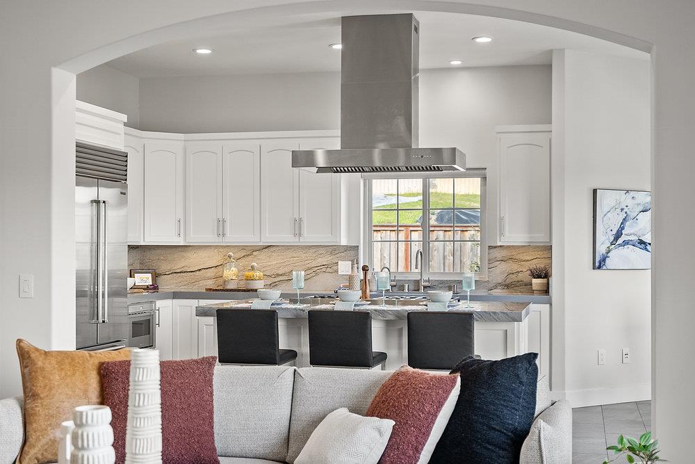 40 Indy Circle Soquel, CA 95073 - Photo 16 of 65 a kitchen with stainless steel appliances kitchen island granite countertop a sink and cabinets
