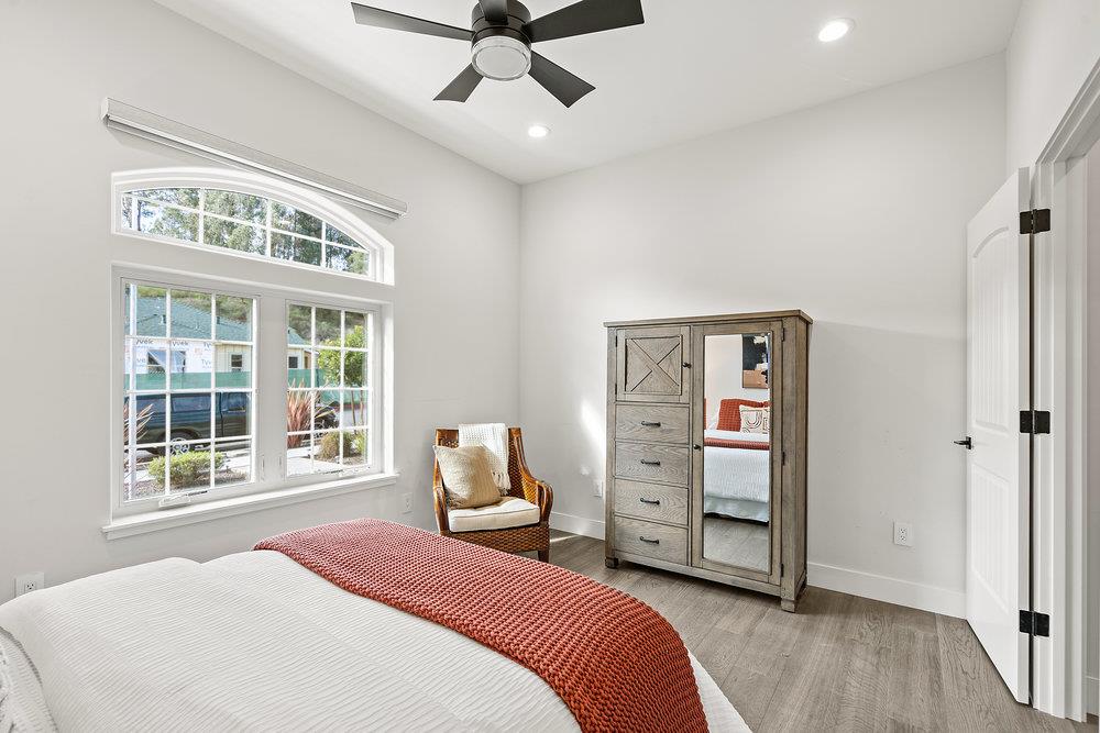 40 Indy Circle Soquel, CA 95073 - Photo 29 of 65 a bedroom with a large bed and a window