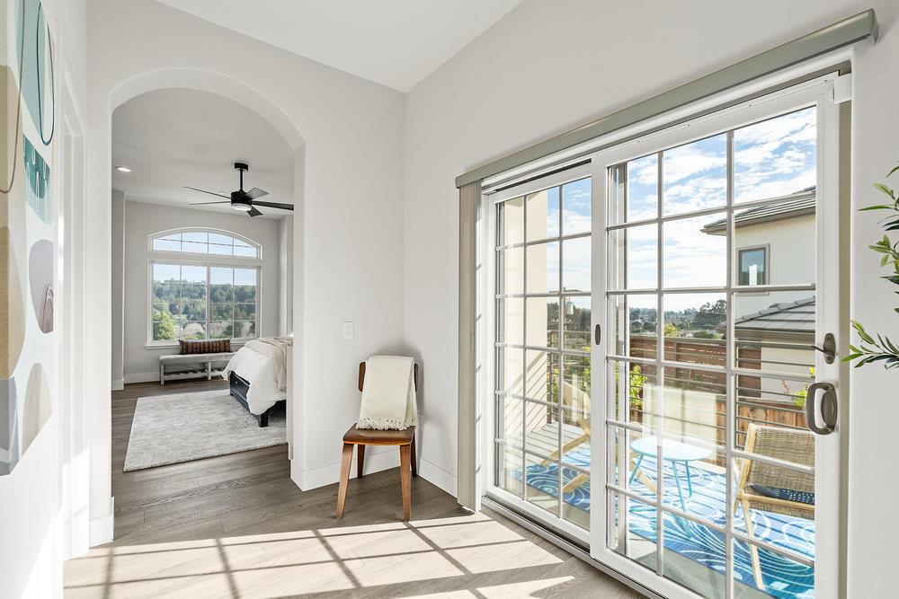 40 Indy Circle Soquel, CA 95073 - Photo 30 of 65 a living room with furniture and a floor to ceiling window