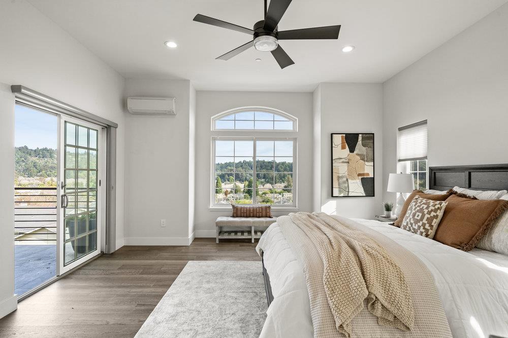 40 Indy Circle Soquel, CA 95073 - Photo 32 of 65 a spacious bedroom with a large bed and a window