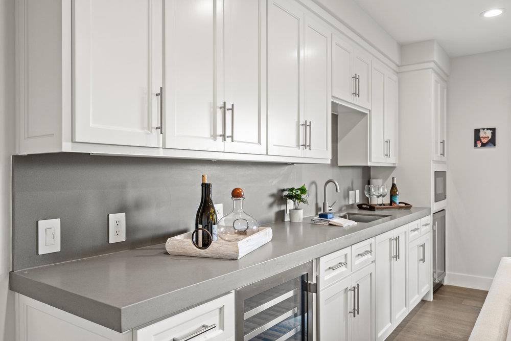40 Indy Circle Soquel, CA 95073 - Photo 39 of 65 a kitchen with stainless steel appliances white cabinets and a sink