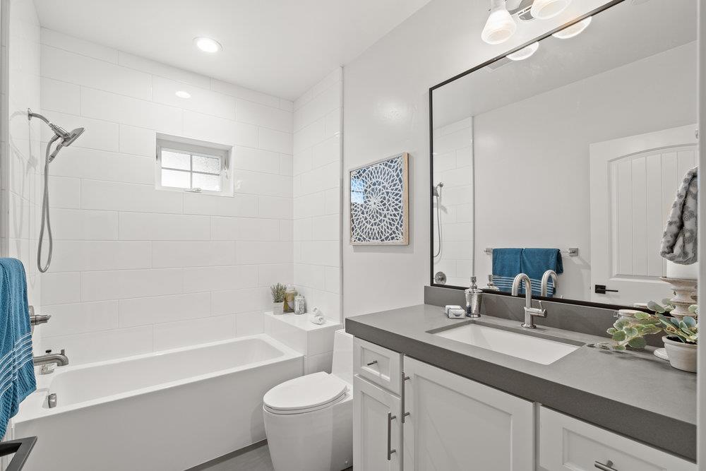 40 Indy Circle Soquel, CA 95073 - Photo 50 of 65 a bathroom with a tub a sink and mirror
