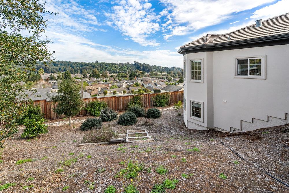 40 Indy Circle Soquel, CA 95073 - Photo 65 of 65 a view of a chair and table in backyard