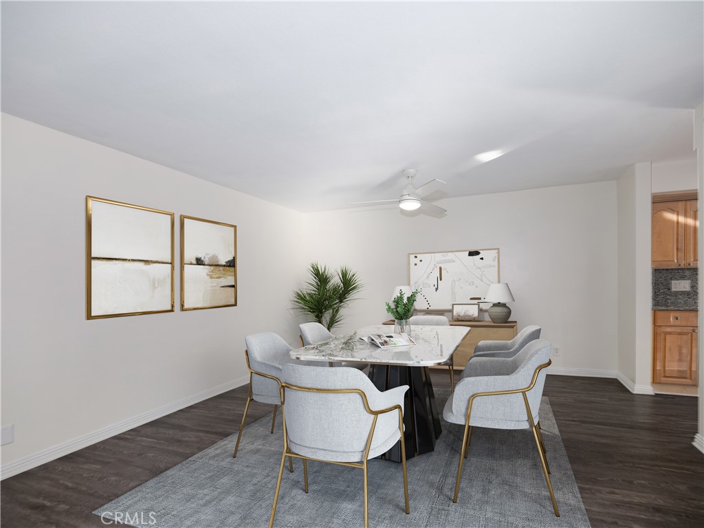 5411 Tyrone Avenue Sherman Oaks, CA 91401 - Photo 7 of 28 a view of a dining room with furniture and wooden floor