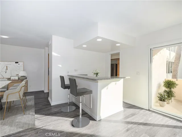 a view of kitchen with livingroom and furniture