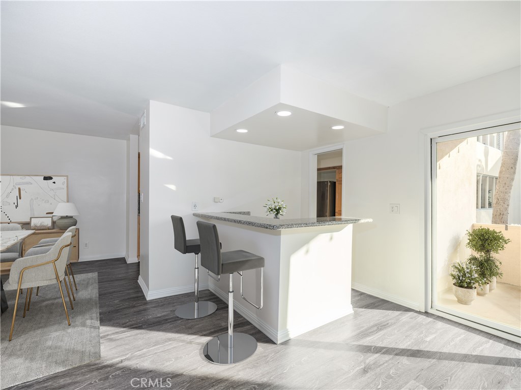 5411 Tyrone Avenue Sherman Oaks, CA 91401 - Photo 8 of 28 a view of kitchen with livingroom and furniture