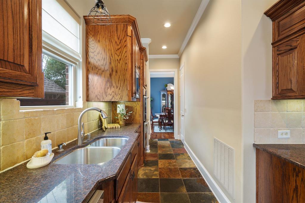 9144 Calvert Road Lantana, TX 76226 - Photo 14 of 40 a bathroom with sink and mirror