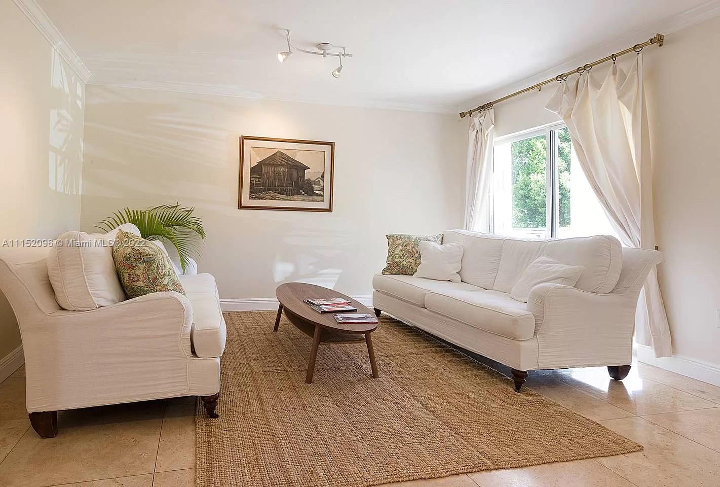272 Fernwood Road Key Biscayne, FL 33149 - Photo 2 of 30 a living room with furniture and a window