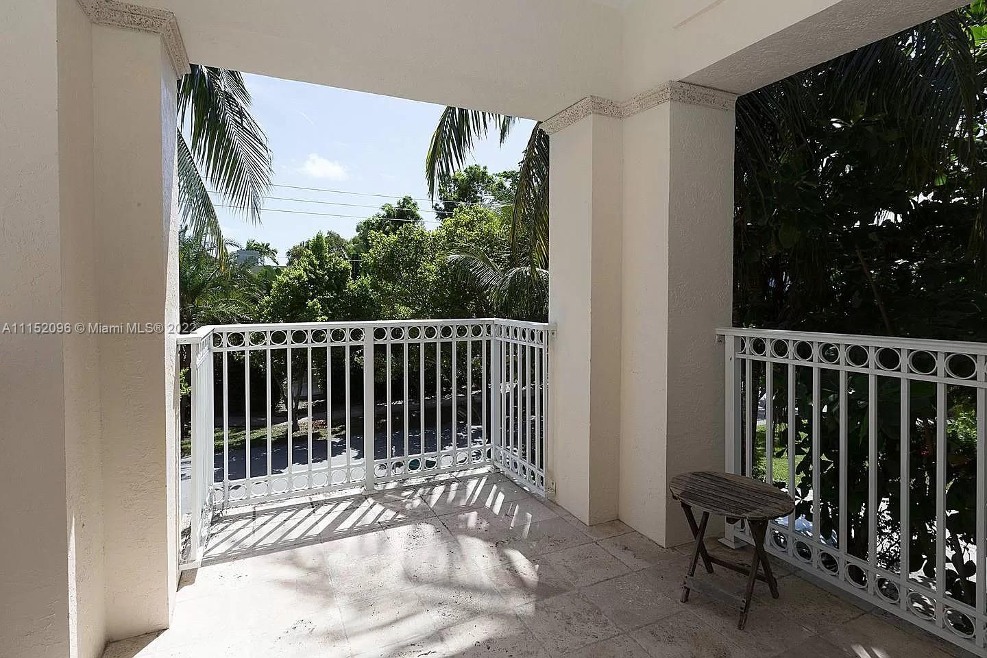 272 Fernwood Road Key Biscayne, FL 33149 - Photo 25 of 30 a view of a balcony with chairs