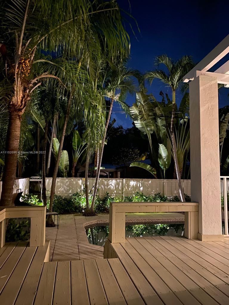 272 Fernwood Road Key Biscayne, FL 33149 - Photo 26 of 30 a view of entryway with wooden floor