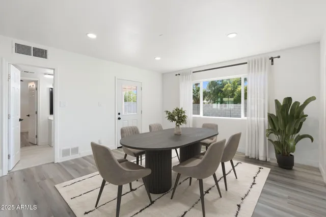 a view of a dining room with furniture