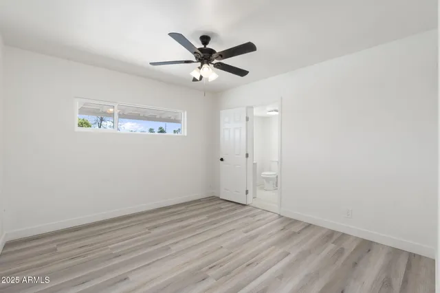 a bathroom with a sink a vanity and a shower
