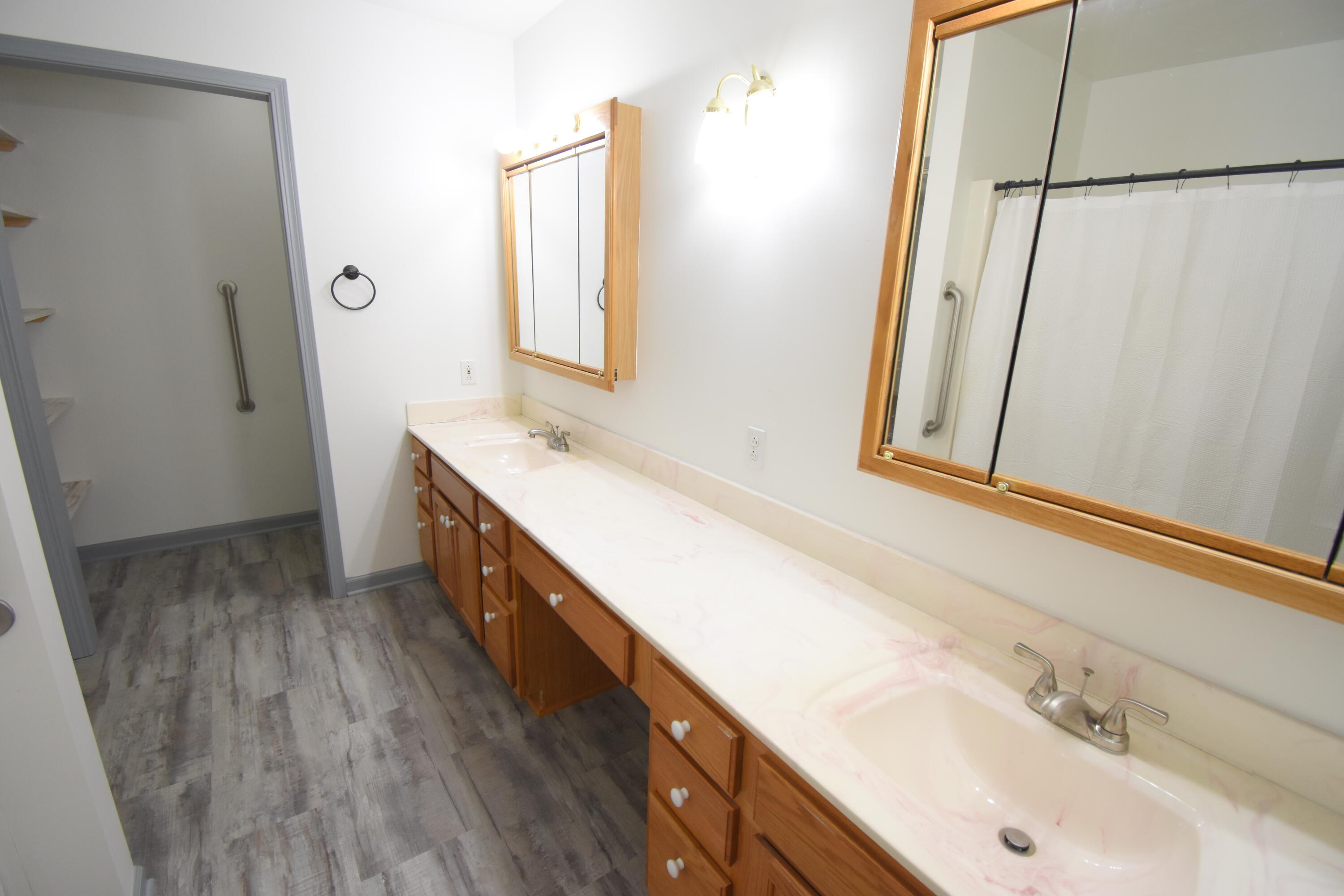 522 Pheasant Run Rensselaer, IN 47978 - Photo 43 of 55 a spacious bathroom with a double vanity sink and a mirror