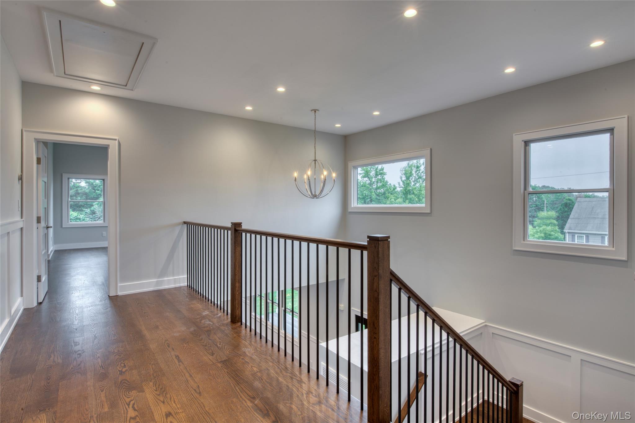 435 Maple Lane Greenport, NY 11944 - Photo 20 of 44 a view of hallway with wooden floor