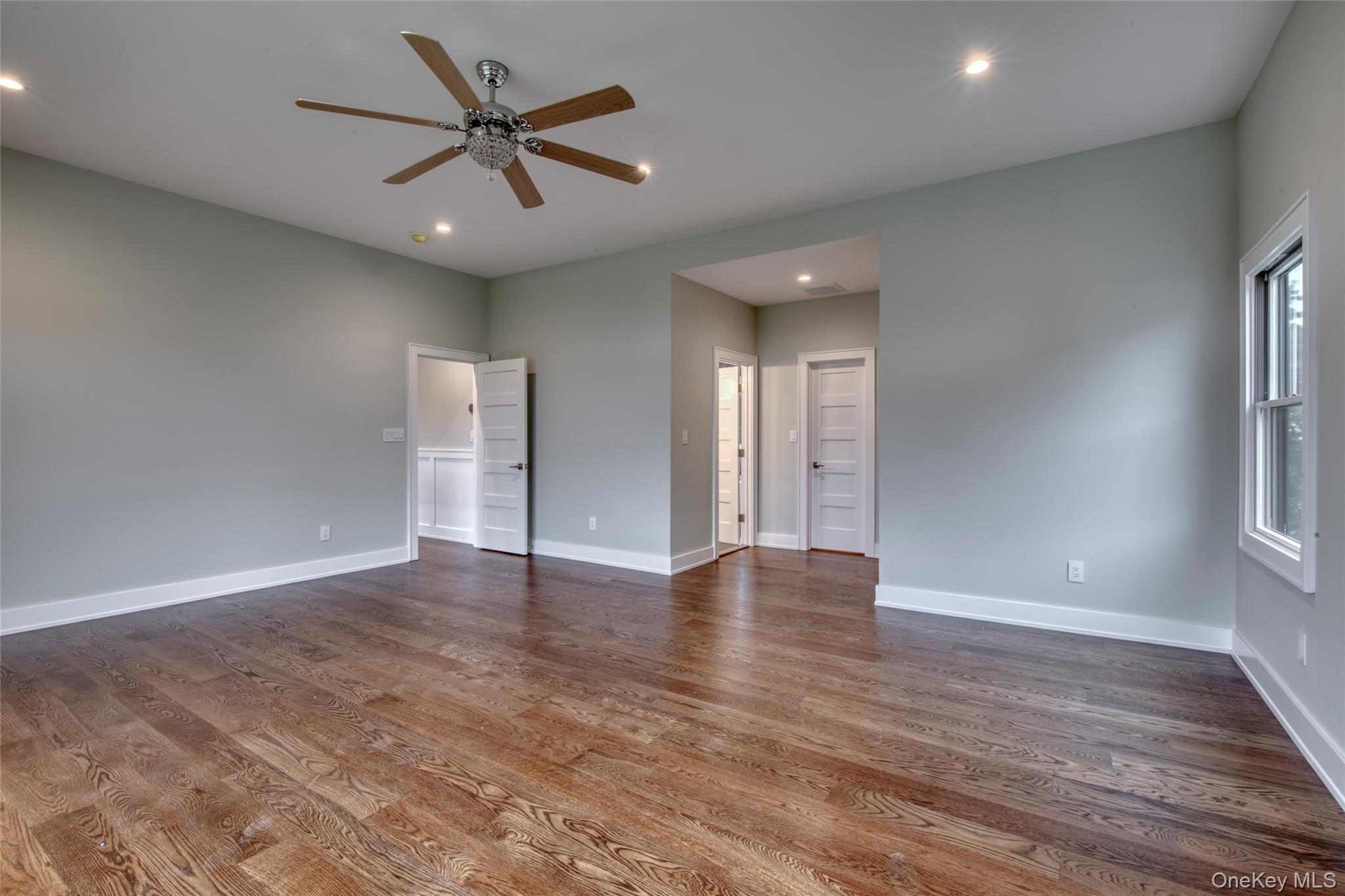 435 Maple Lane Greenport, NY 11944 - Photo 37 of 44 wooden floor in an empty room with a window
