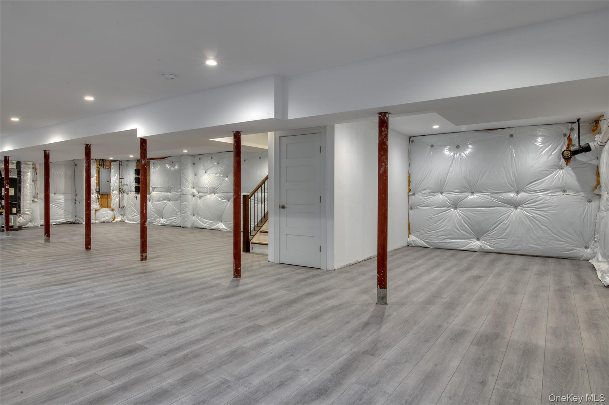 435 Maple Lane Greenport, NY 11944 - Photo 39 of 44 a view of a room with wooden floor