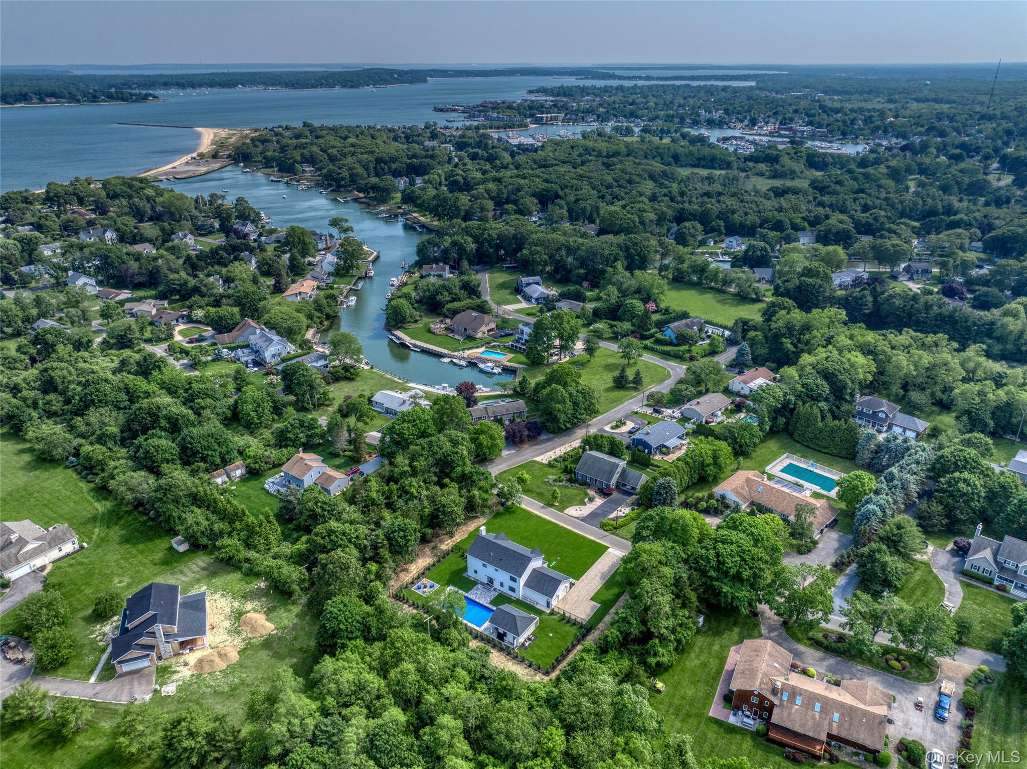 435 Maple Lane Greenport, NY 11944 - Photo 41 of 42 Aerial overview of property's location with a nearby body of water and nearby suburban area