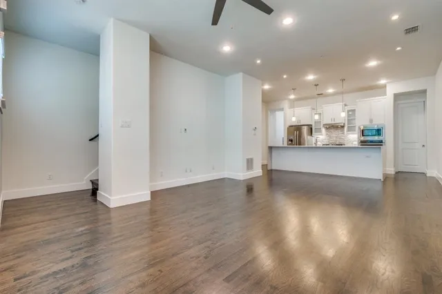 a view of a kitchen and front door