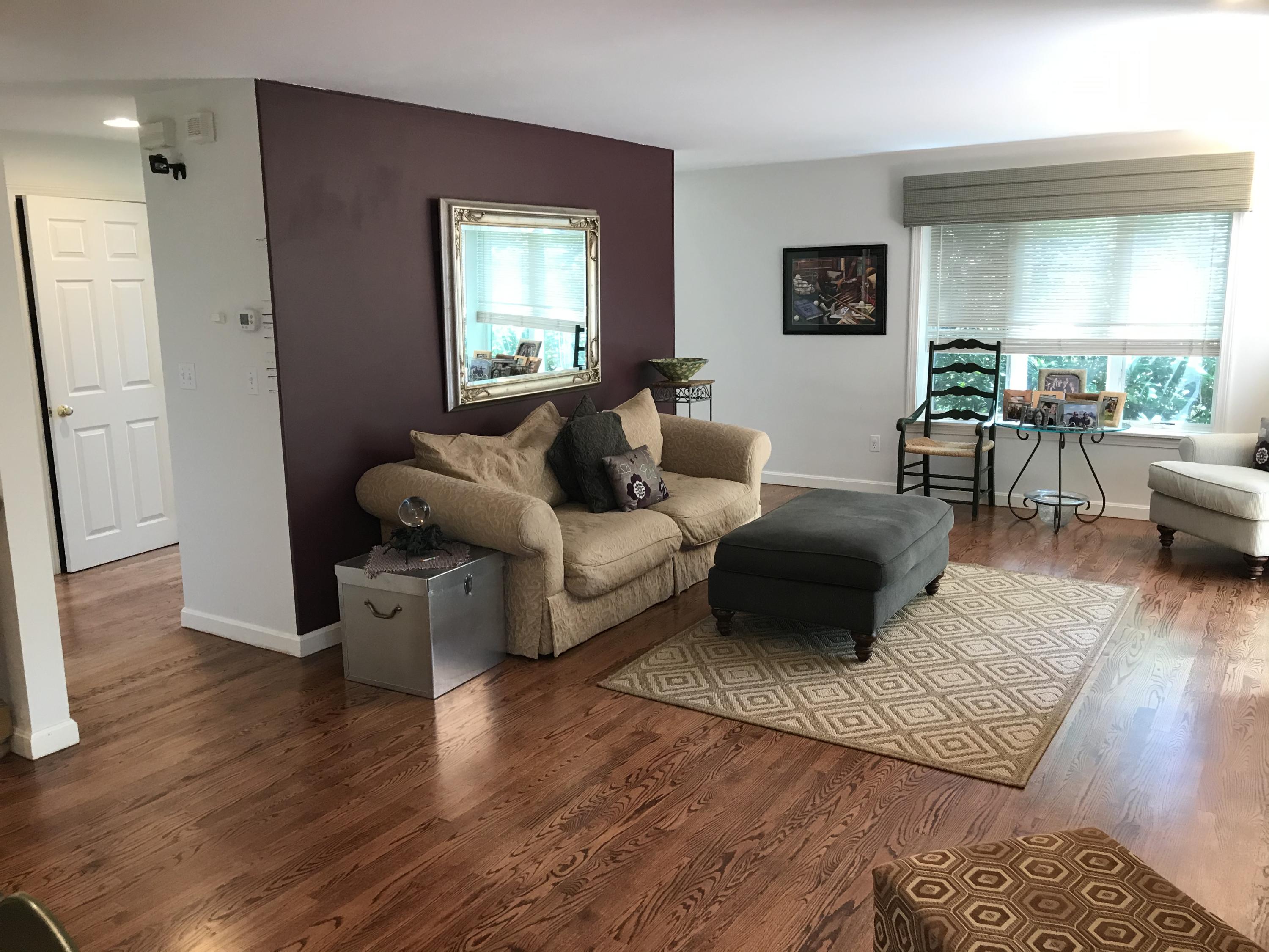 5 Wood Road Mashpee, MA 02649 - Photo 11 of 53 a living room with furniture and a wooden floor
