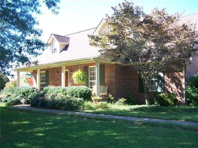 4016 New Chapel Road Springfield, TN 37172 - Photo 1 of 20 a view of a house with garden and yard