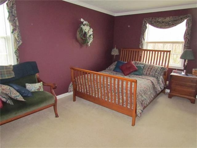 4016 New Chapel Road Springfield, TN 37172 - Photo 12 of 20 a bedroom with a bed and window