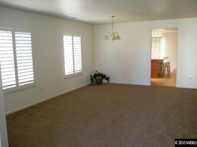 7680 Appenzell Street Reno, NV 89506 - Photo 5 of 10 a livingroom with window