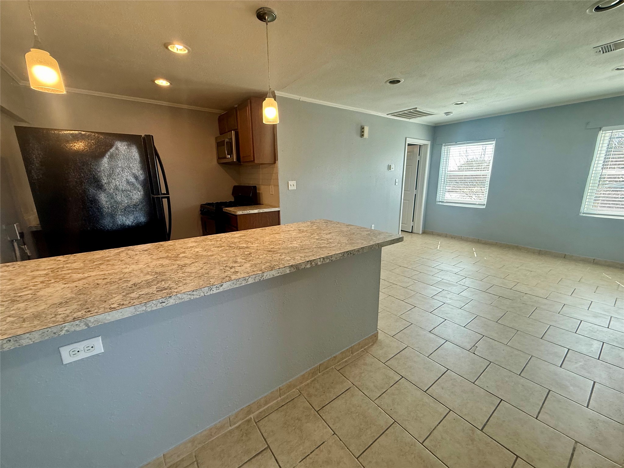 429 West 2nd Street Freeport, TX 77541 - Photo 33 of 49 Open kitchen and living space