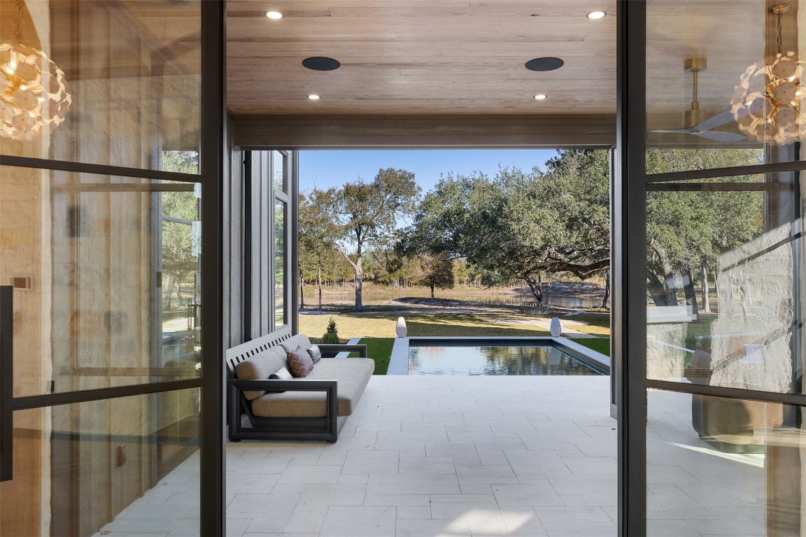 226 Hackemack Road Round Top, TX 78954 - Photo 12 of 50 a balcony with furniture and view of outdoor space