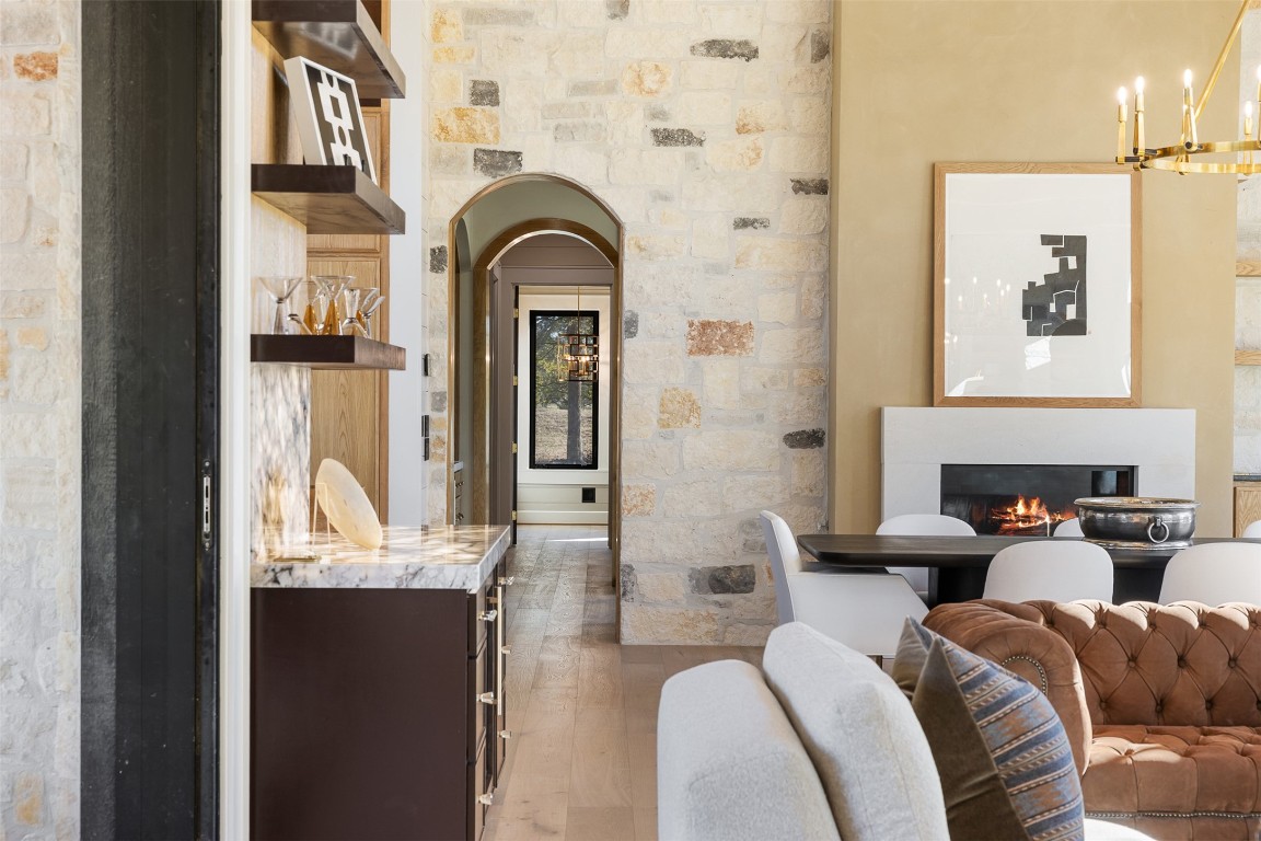226 Hackemack Road Round Top, TX 78954 - Photo 23 of 50 a living room with furniture and a fireplace