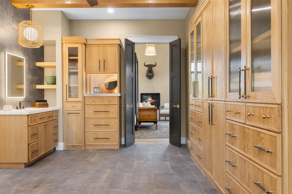226 Hackemack Road Round Top, TX 78954 - Photo 33 of 50 a view of walk in closet and bathroom