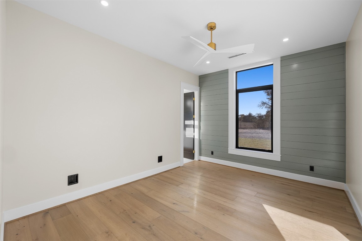 226 Hackemack Road Round Top, TX 78954 - Photo 41 of 50 an empty room with a empty space and windows