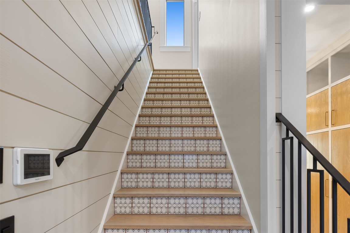 226 Hackemack Road Round Top, TX 78954 - Photo 43 of 50 a view of a hallway with wooden floor and staircase