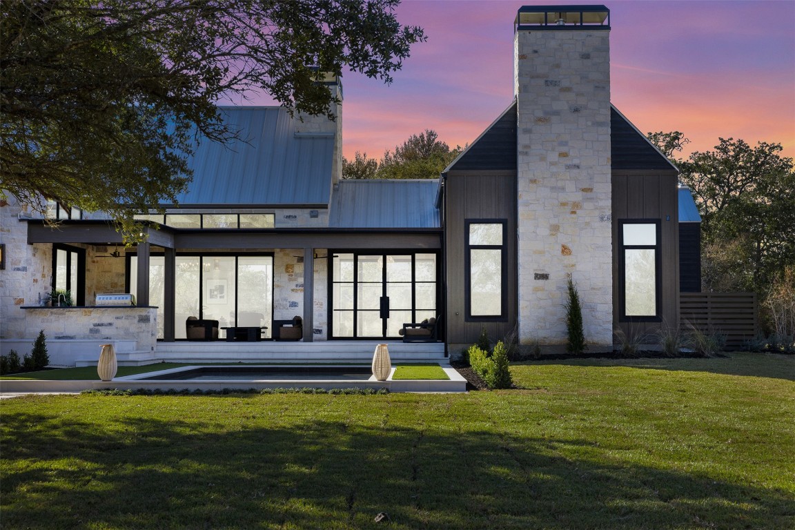 226 Hackemack Road Round Top, TX 78954 - Photo 47 of 50 a front view of a house with a yard