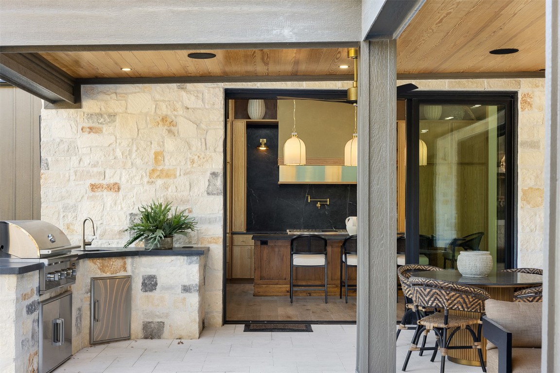 226 Hackemack Road Round Top, TX 78954 - Photo 10 of 50 a living room filled with furniture and a potted plant