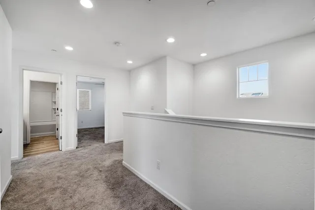 a view of a livingroom with wooden floor