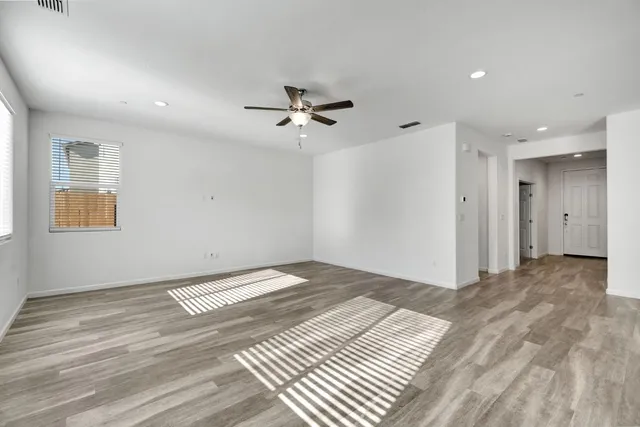 a view of a livingroom with a ceiling fan