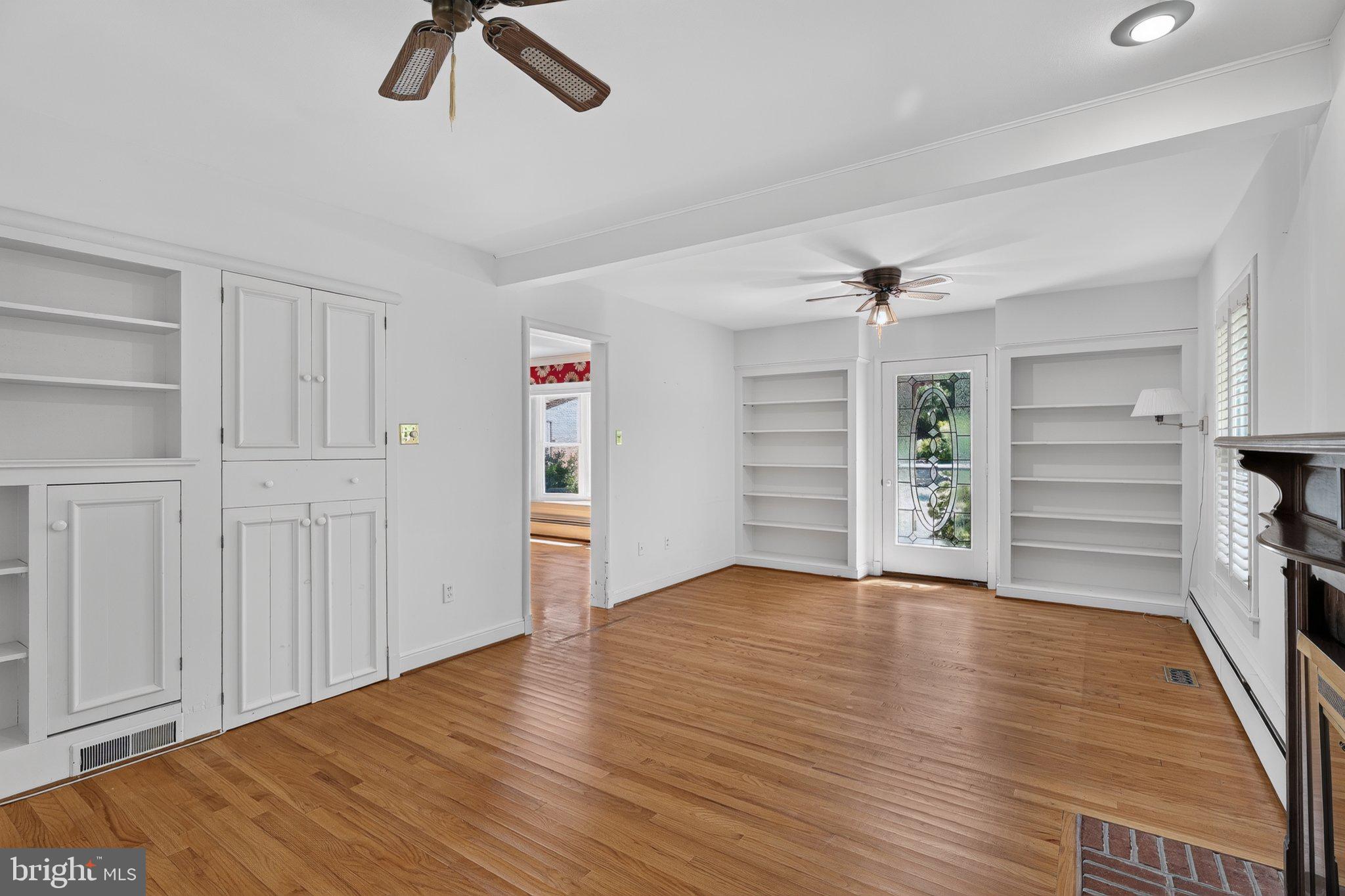 805 Orchard Way Silver Spring, MD 20904 - Photo 8 of 56 Den with built in bookshelves and its own door