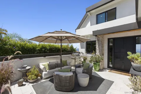 an aerial view of a house with a garden