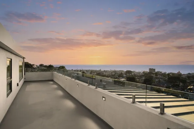 a view of balcony with ocean view