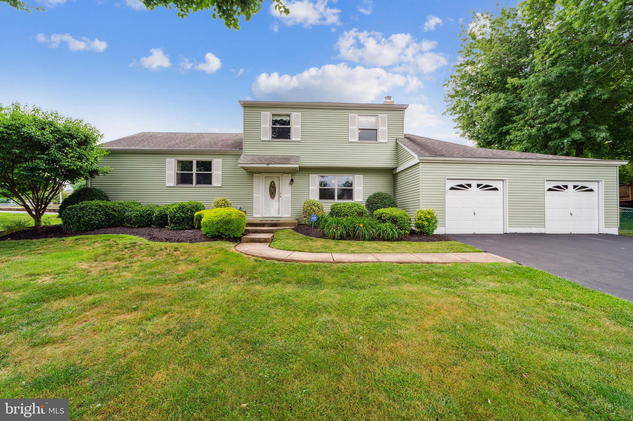 69 St Davids Road Springfield, PA 19064 - Photo 1 of 21 a front view of a house with garden