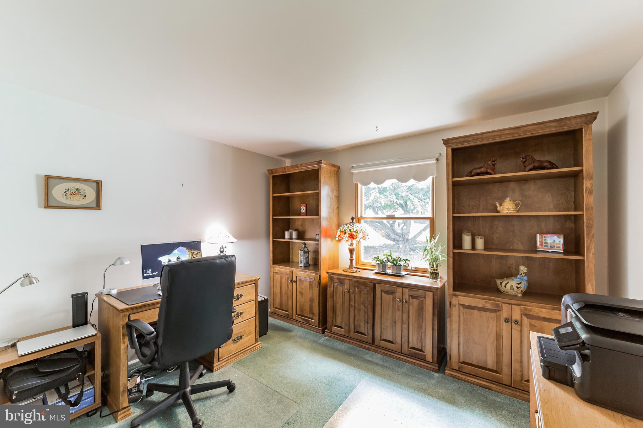 69 St Davids Road Springfield, PA 19064 - Photo 11 of 21 a view of a workspace with furniture and a window