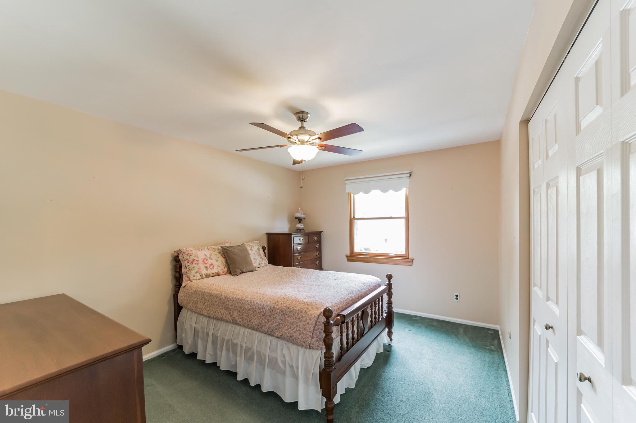 69 St Davids Road Springfield, PA 19064 - Photo 14 of 21 a bedroom with a bed and window